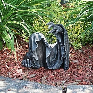 image:imageDesign Toscano Reaping Solace The Creeper Sitting StatueThe Grave Creeper Statue